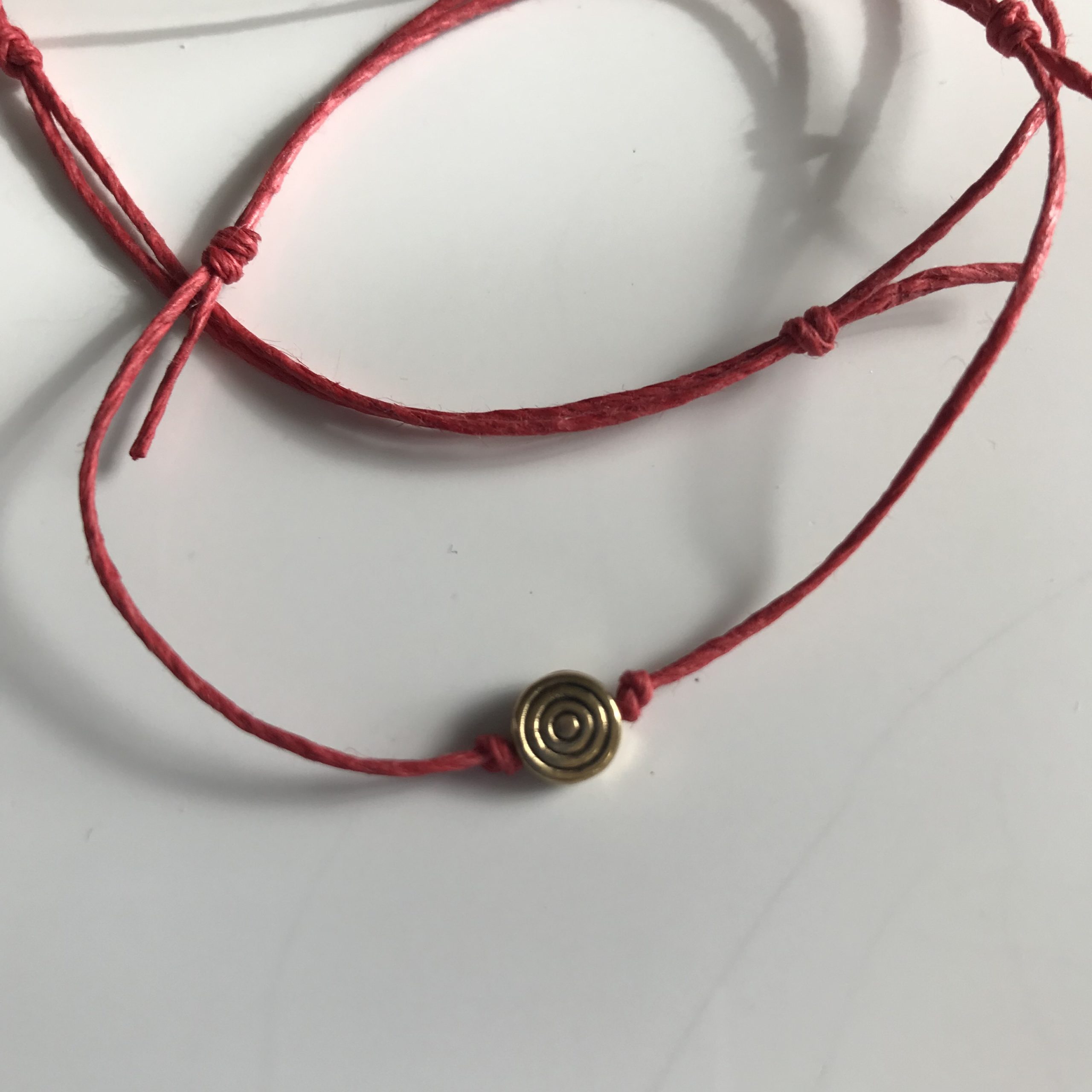 Red Thread Adjustable Bracelet ( extra small gold spiral